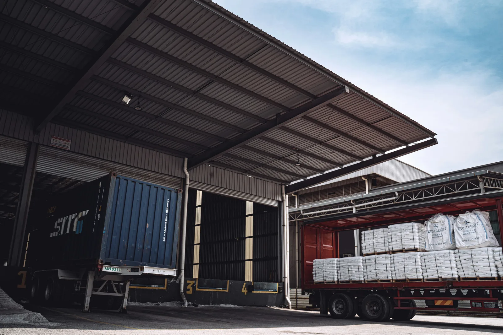 Empty warehouse loading bays numbered two, three and four